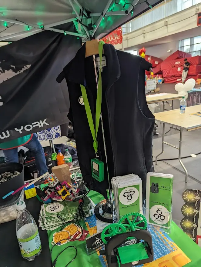 Vestability haptic feedback vest prototype displayed on a stand